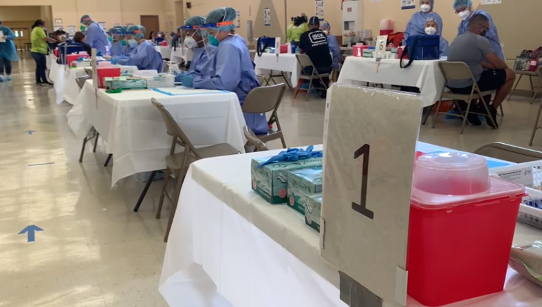 Long lines form as residents receive second vaccine dose