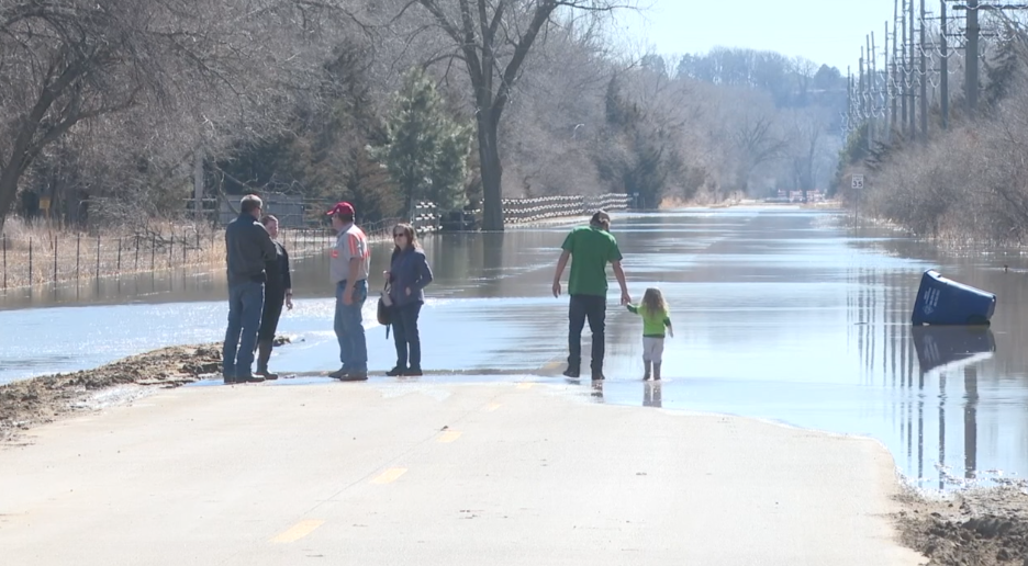 Family talks after Platte River overflowing
