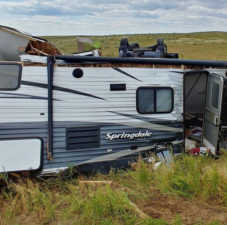 Mitchell Fire Department responds to vehicle, camper rollover